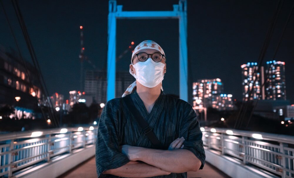 man at night wearing a jinbei