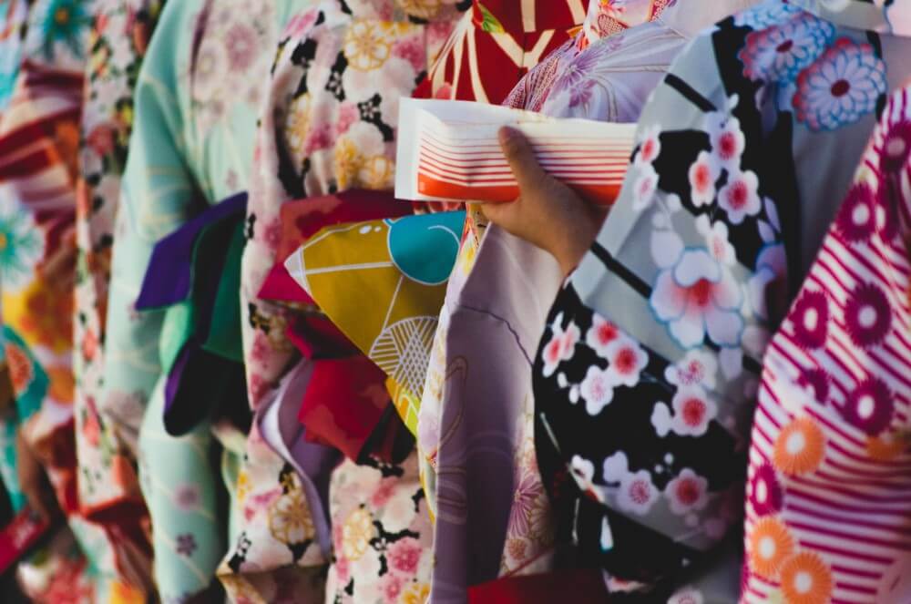 kimonos on a clothing rack