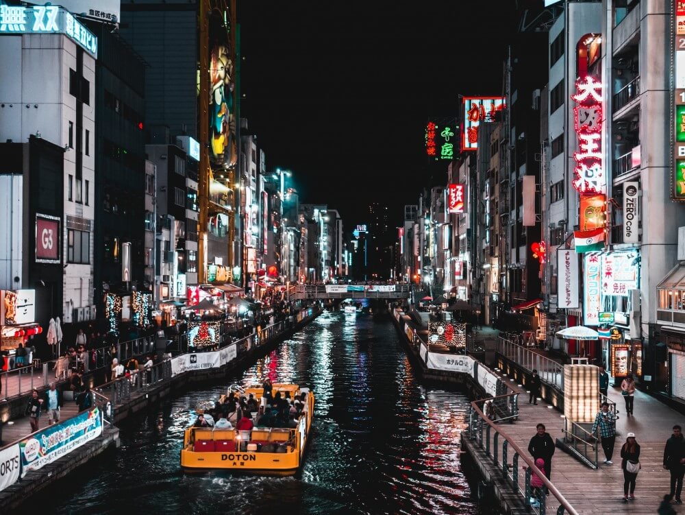 A brightly lit street in the Dotonbori district