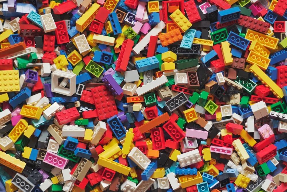 a collection of plastic Lego pieces