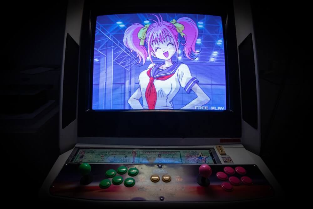an anime girl on an arcade game