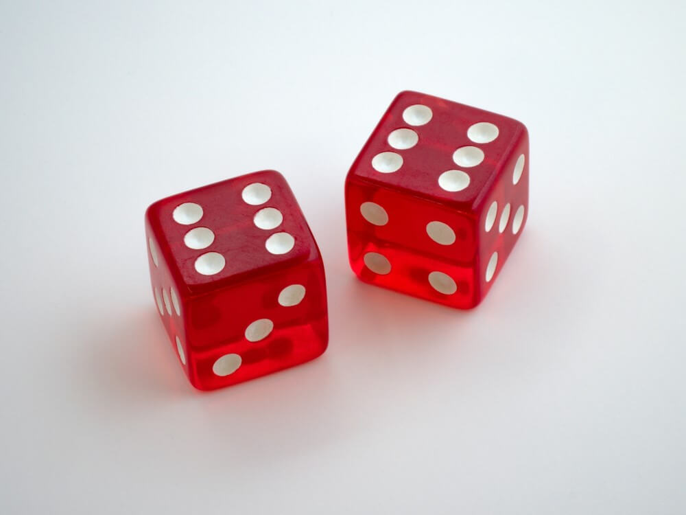 a pair of white and red dice