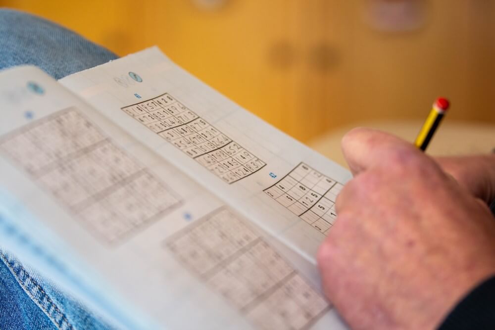 a sudoku book being completed